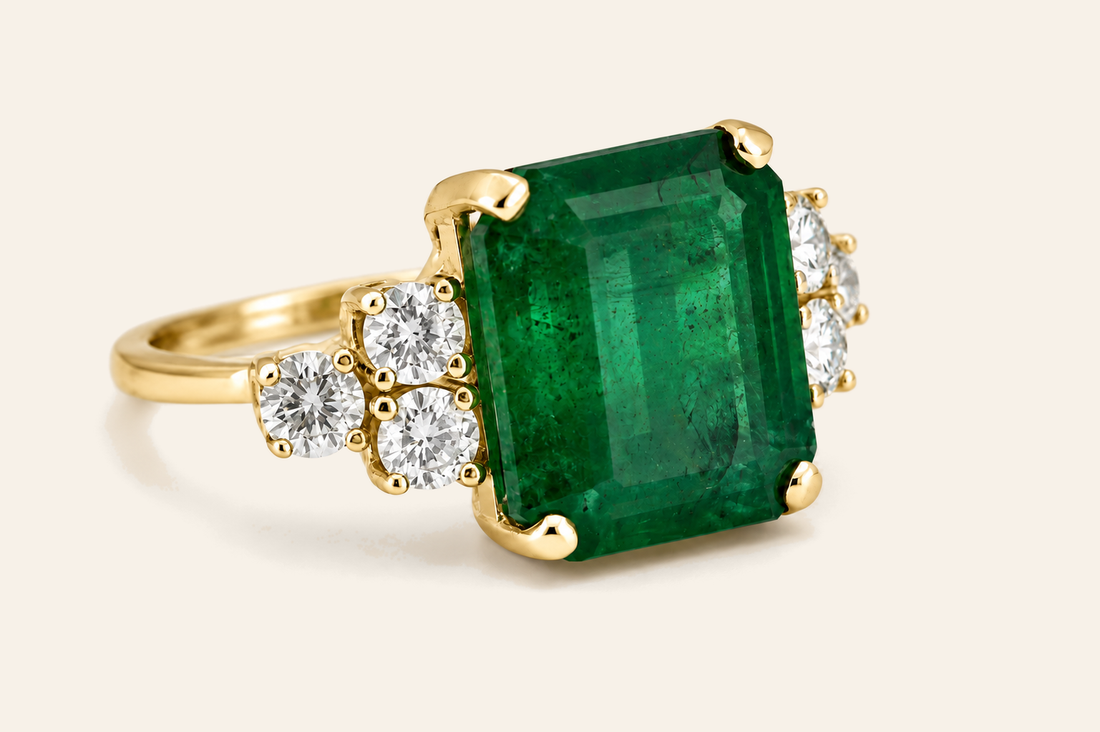 18K gold emerald and diamond cluster ring