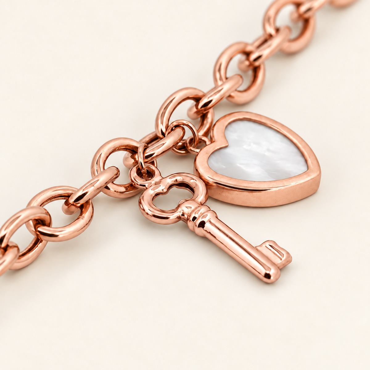 10K Gold Heart-and-Key Charm Bracelet — Rose Gold