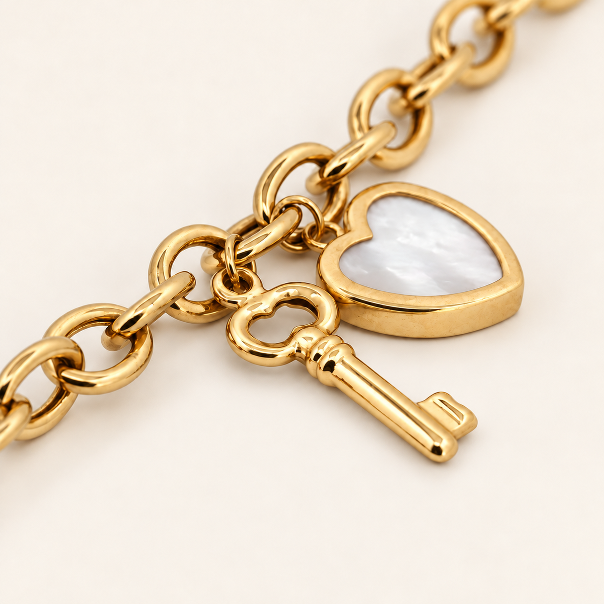 10K Gold Heart-and-Key Charm Bracelet — Yellow Gold
