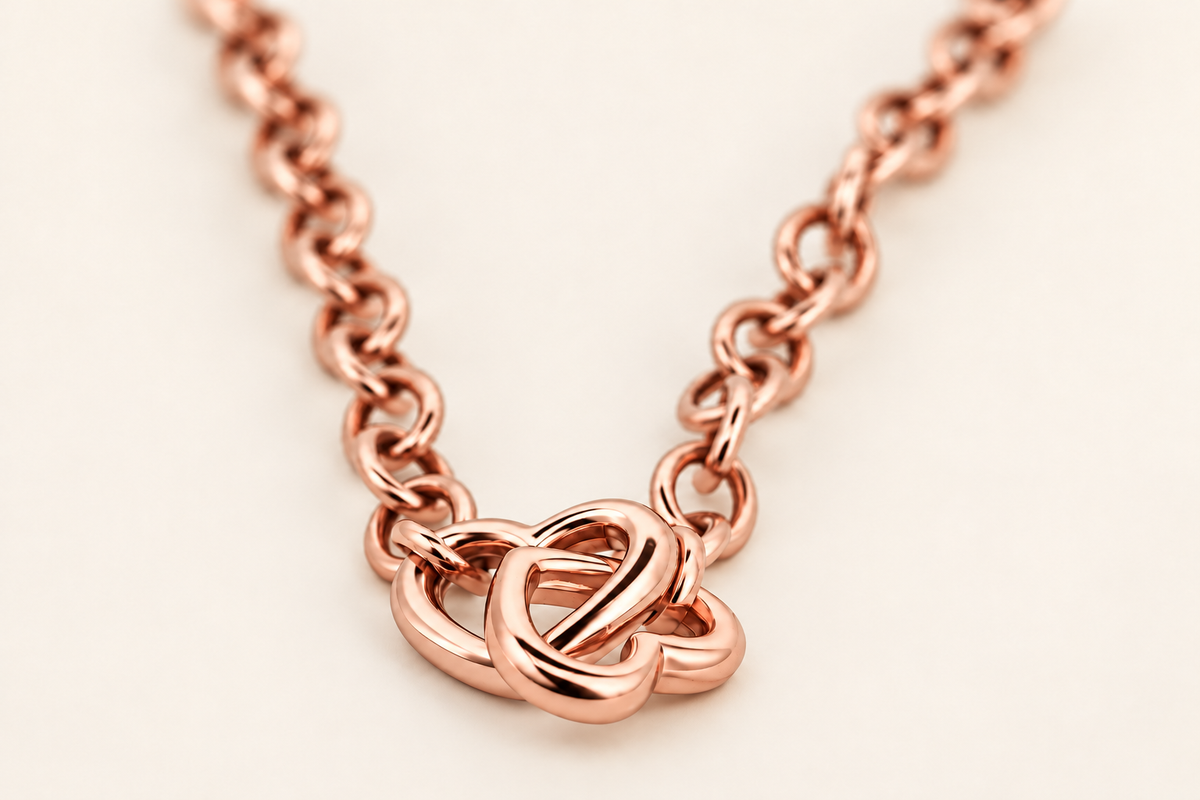 10K Gold Interlocking-Hearts Bracelet — Rose Gold