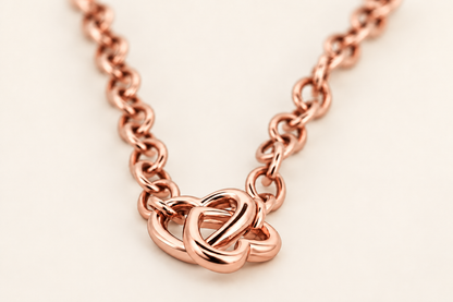 10K Gold Interlocking-Hearts Bracelet — Rose Gold