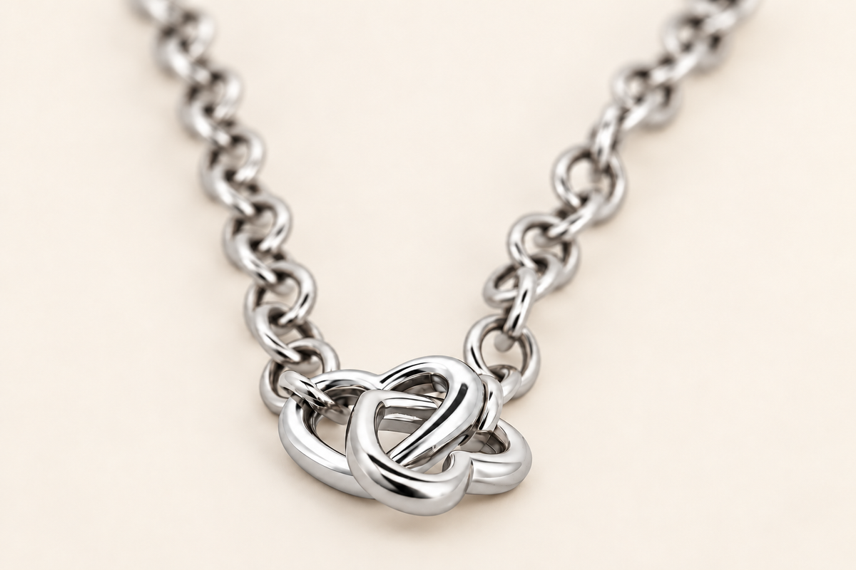 10K Gold Interlocking-Hearts Bracelet — White Gold