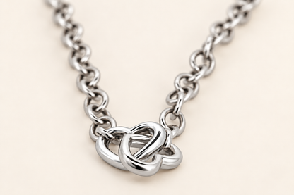 10K Gold Interlocking-Hearts Bracelet — White Gold
