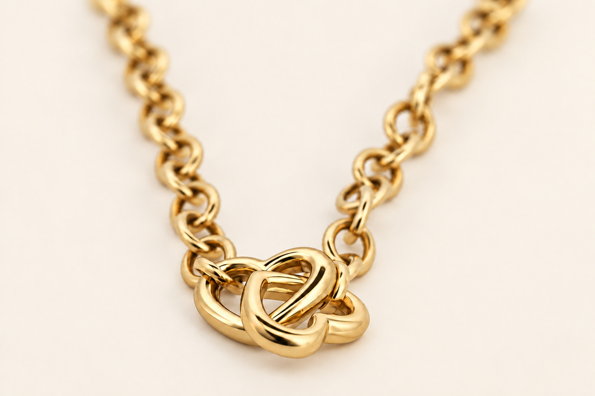 10K Gold Interlocking-Hearts Bracelet — Yellow Gold